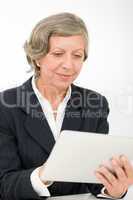 Senior businesswoman touch-screen tablet computer