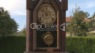 Old clock pendulum time concept