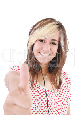 Smiling beautiful woman with thumbs up. Focus on the girl