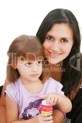 Young mother and daugther embracing