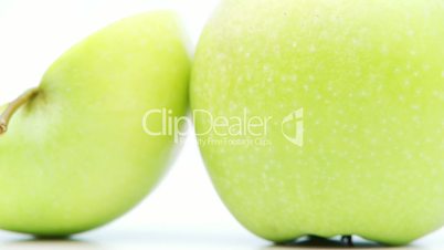 single and sliced apple closeup – loopable