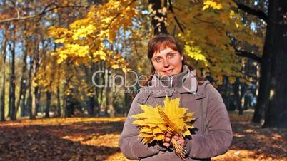 Woman Holds Leaves