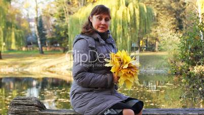 Woman Sits On Bench