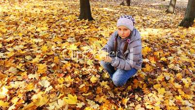 Girl Collects Leaves