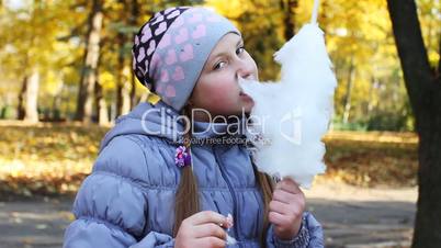 Girl Eats Tasty Candy Floss
