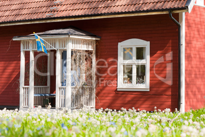 Traditionelles rotes Holzhaus in Schweden / Traditional red cottage in Sweden