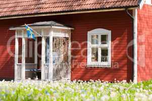 Traditionelles rotes Holzhaus in Schweden / Traditional red cottage in Sweden