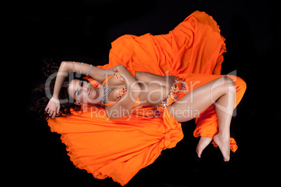 beauty dancer lay in traditional arabian costume