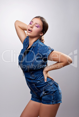 Sexy girl posing in jeans dress show desire