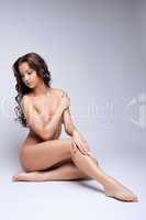 Cute nude girl posing naked for art photography