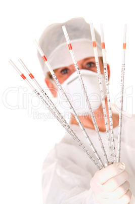 doctor with mask holding sticks