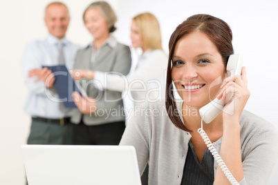 Business team pretty businesswoman calling phone