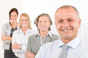 Business team happy mature man with colleagues