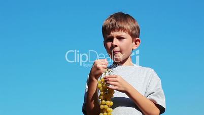 boy eats a vine
