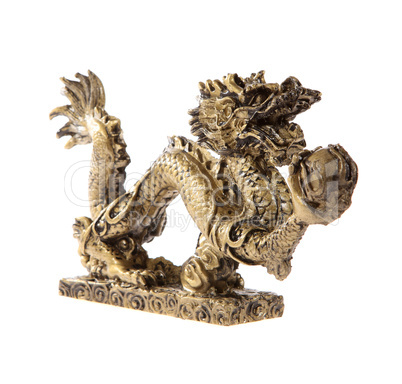 Figurine of a dragon on a white background, souvenir