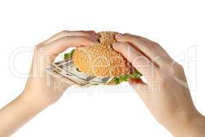 Hamburger with money in hand on white