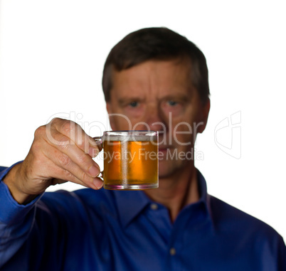 Senior man with glass of beer