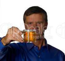 Senior man with glass of beer