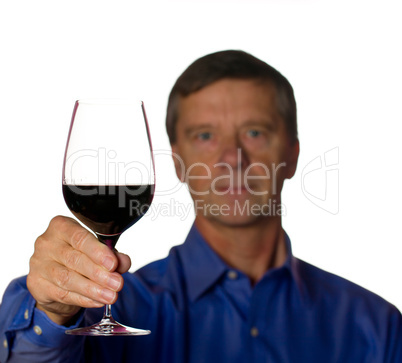 Senior man with glass of red wine