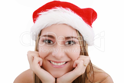 Picture of pretty christmas girl in santa hat, smiling isolated