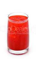 glass of red orange juice with ice
