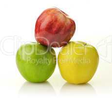 Yellow, green and red apples