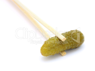 sushi cucumber gherkin on chopstick