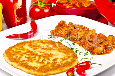 hungarian goulash with potato pancakes