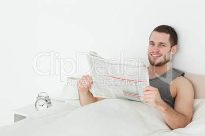 Quiet man reading a newspaper