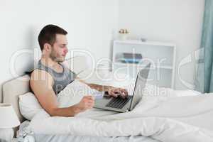 Handsome man purchasing online