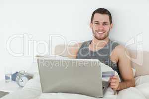 Young man shopping online