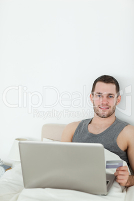 Portrait of a man shopping online