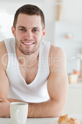 Portrait of a man having breakfast