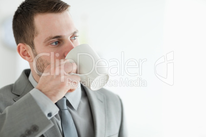 Businessman drinking tea