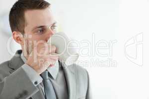 Businessman drinking tea