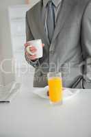 Portrait of a breakfast taken by a businessman