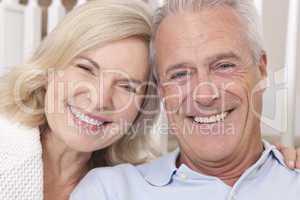 Happy Senior Man & Woman Couple Smiling at Home