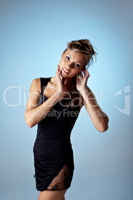 Sexy woman posing in black peignoir