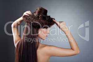 Cute naked woman posing with hair style hat