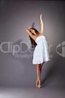 Perfect young dancer in white cloth