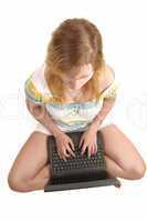 Teenager girl with laptop.