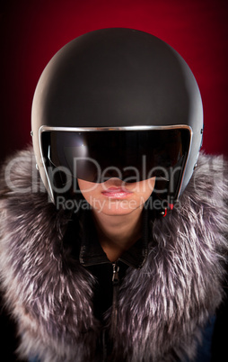 Biker girl in a helmet