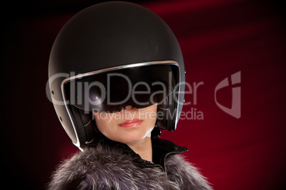 Biker girl in a helmet