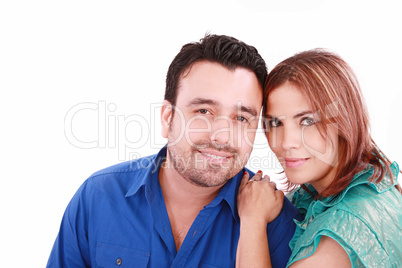 Portrait of a beautiful young happy smiling couple - isolated