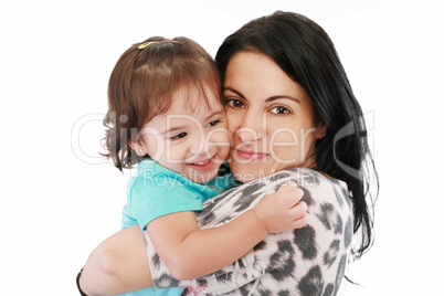 little girl hugging to mother, in her arms