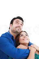 Closeup portrait of a happy  couple looking at something interes