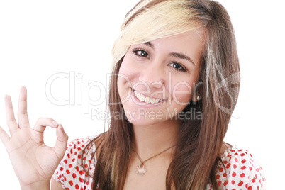 bright picture of lovely teenage girl showing ok sign