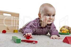 baby playing on floor