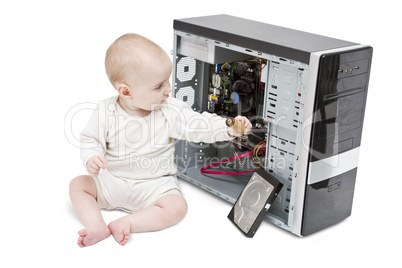 young child working on open computer