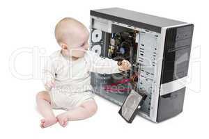 young child working on open computer